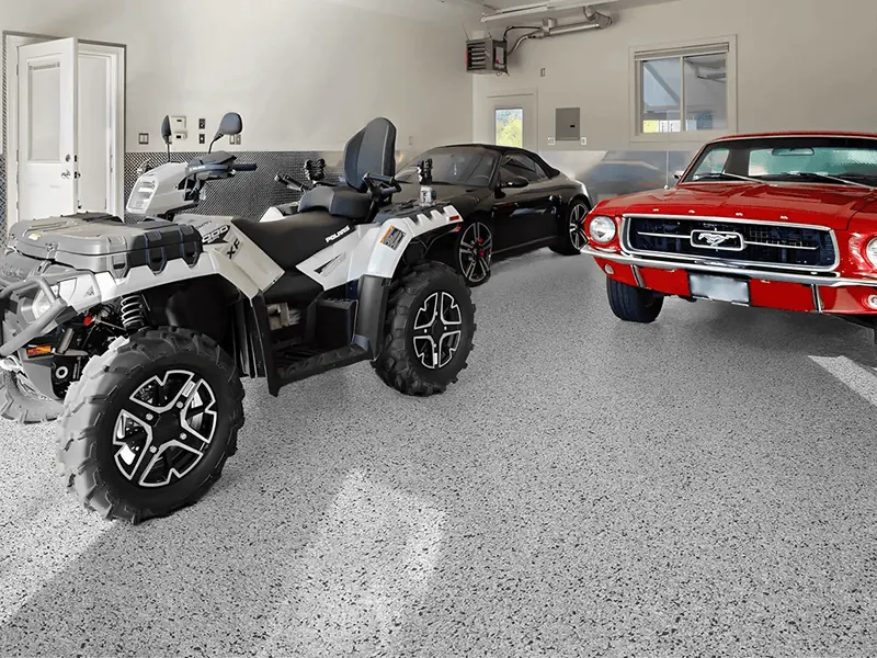 Coated garage floor with cars and an ATV
